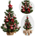 KI-generiertes Bild Deko Weihnachtsbaum 60cm Grün Rot geschmückt Sockel Tannenbaum Tisch Dekoration