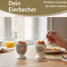 KI-generiertes Bild,Eierbecher Echt-Gold Motiv "Herz Gold" Schwarz Weiß Gute Laune Eierhalter