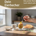 KI-generiertes Bild,Eierbecher Echt-Gold Spruch "Weich Ei" Gute Laune Eierhalter