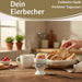 KI-generiertes Bild,Eierbecher Echt-Gold Spruch "GUTEN MORGEN" Leo Muster Gute Laune Eierhalter