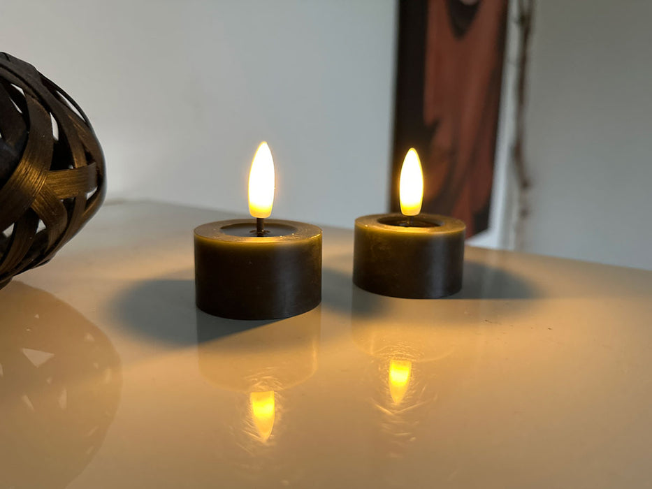 KI-generiertes Bild,2x LED 3D Teelichter Ribe Schwarz 4,5cm Echtwachs Spiegel flackernde flammenlose Kerze