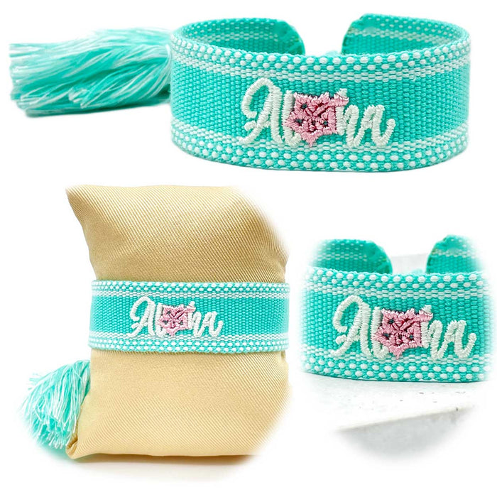 KI-generiertes Bild Canvas Statement Armband Aloha Türkis Weiß Rosa Quasten besticktes Webarmband