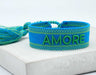 KI-generiertes Bild,Canvas Statement Armband Amore ?? Blau Grün Quasten besticktes Webarmband
