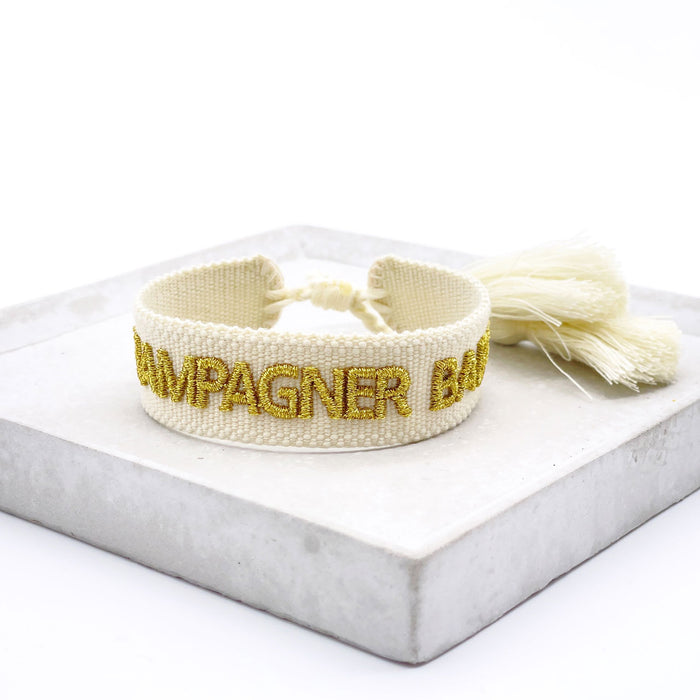 KI-generiertes Bild,Canvas Statement Armband Champagner Baby Quasten besticktes Webarmband