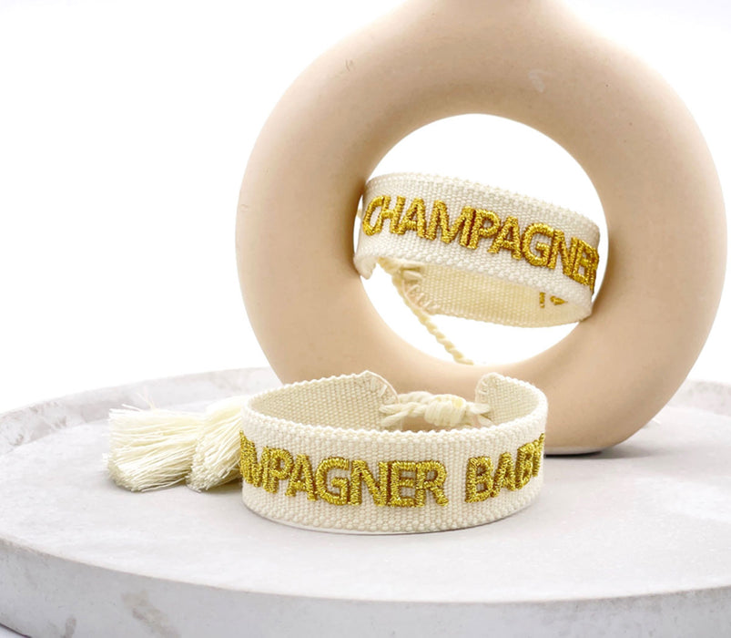 KI-generiertes Bild,Canvas Statement Armband Champagner Baby Quasten besticktes Webarmband