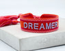 KI-generiertes Bild,Canvas Statement Armband Dreamer Rot Grau Quasten besticktes Webarmband