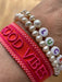 KI-generiertes Bild,Canvas Statement Armband Good Vibes Rot Quasten besticktes Webarmband