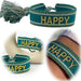 KI-generiertes Bild Canvas Statement Armband Happy Petrol Grün Gold Quasten besticktes Webarmband
