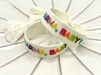 KI-generiertes Bild,Canvas Statement Armband Karma Baby Multi Bunt Quasten besticktes Webarmband