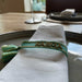 KI-generiertes Bild,Canvas Statement Armband Karma Türkis Gold Quasten besticktes Webarmband