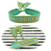 KI-generiertes Bild Canvas Statement Armband Karma Türkis Gold Quasten besticktes Webarmband
