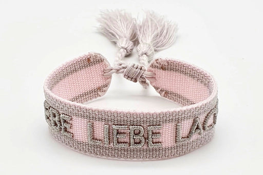 KI-generiertes Bild,Canvas Statement Armband Lebe Liebe Lache Rosa Quasten besticktes Webarmband