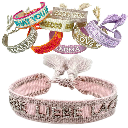 KI-generiertes Bild Canvas Statement Armband Lebe Liebe Lache Rosa Quasten besticktes Webarmband