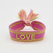 KI-generiertes Bild,Canvas Statement Armband Love Lila Grün Quasten besticktes Webarmband