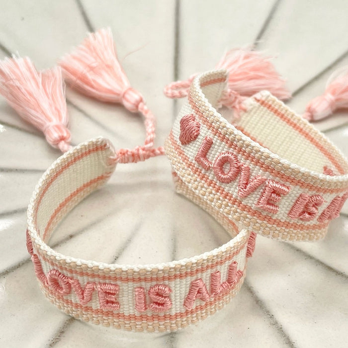 KI-generiertes Bild,Canvas Statement Armband Love is All Rosy Peach Quasten besticktes Webarmband
