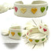 KI-generiertes Bild Canvas Statement Armband Herzen Multi Colour Bunt Quasten besticktes Webarmband
