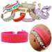 KI-generiertes Bild Canvas Statement Armband Optimistin Neon Pink Orange Quasten besticktes Webarmband