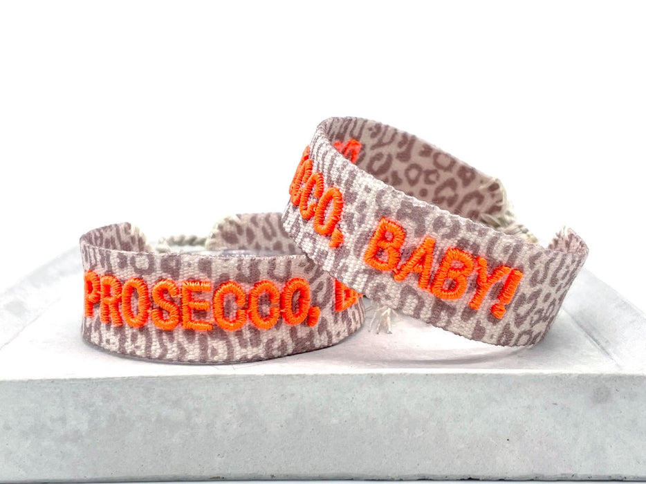 KI-generiertes Bild,Canvas Statement Armband Leo Prosecco Baby Leopard Quasten besticktes Webarmband