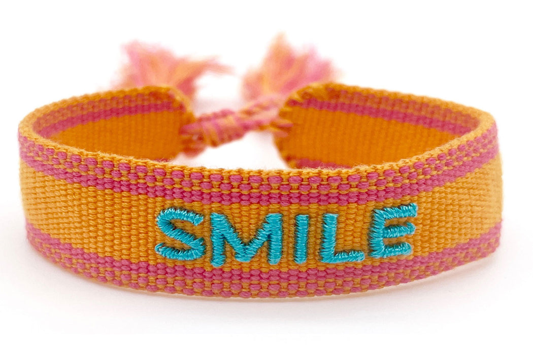 KI-generiertes Bild,Canvas Statement Armband Smile Orange Türkis Quasten besticktes Webarmband