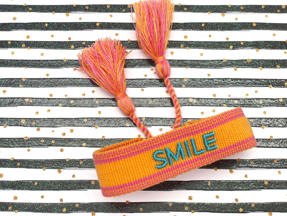 KI-generiertes Bild,Canvas Statement Armband Smile Orange Türkis Quasten besticktes Webarmband