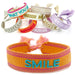 KI-generiertes Bild Canvas Statement Armband Smile Orange Türkis Quasten besticktes Webarmband