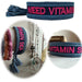 KI-generiertes Bild Canvas Statement Armband Need Vitamin Sea Blau Pink Quasten besticktes Webarmband