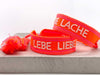 KI-generiertes Bild,Canvas Statement Armband Lebe Liebe Lache Neon Orange Pink Quasten besticktes Webarmband