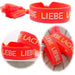 KI-generiertes Bild Canvas Statement Armband Lebe Liebe Lache Neon Orange Pink Quasten besticktes Webarmband