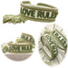 KI-generiertes Bild Canvas Statement Armband Love Rules Weiß Grün Quasten besticktes Webarmband