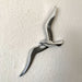 KI-generiertes Bild,Wand Deko-Objekt Möwe 34cm Aluminium Silber Deko-Figur
