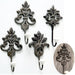 KI-generiertes Bild 2x Vintage Kleiderhaken 15x7cm Braun Blume Garderobenhaken Wandhaken